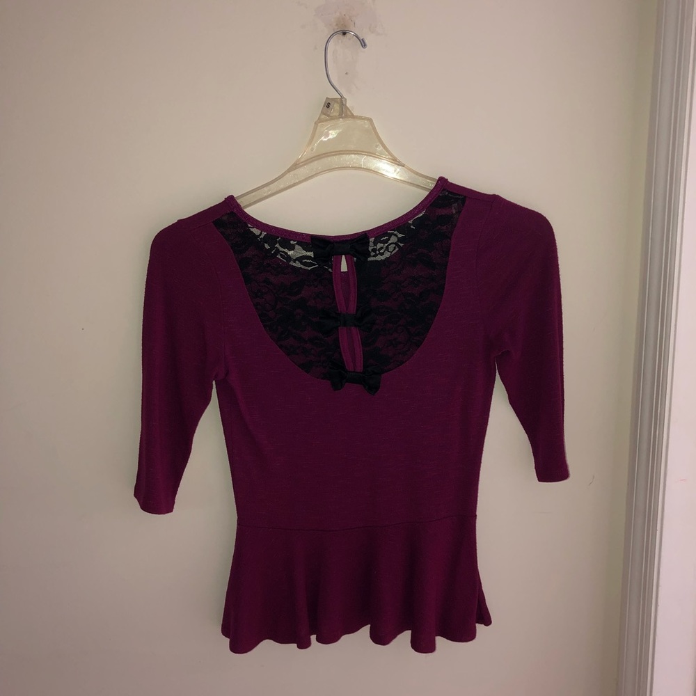 Plum peplum shirt with black lace and bow back